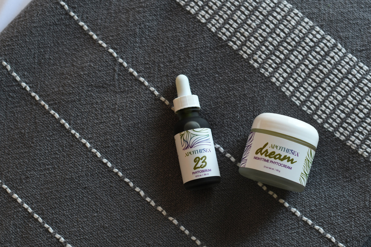 Apothesea Dream Phytocream and 23 Phytoserum on Grey & White Towel